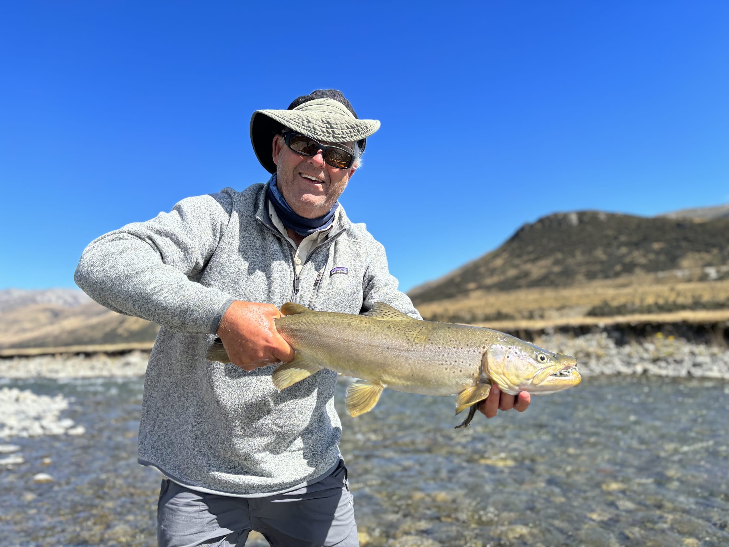 Casting a dry fly on a pristine New Zealand river