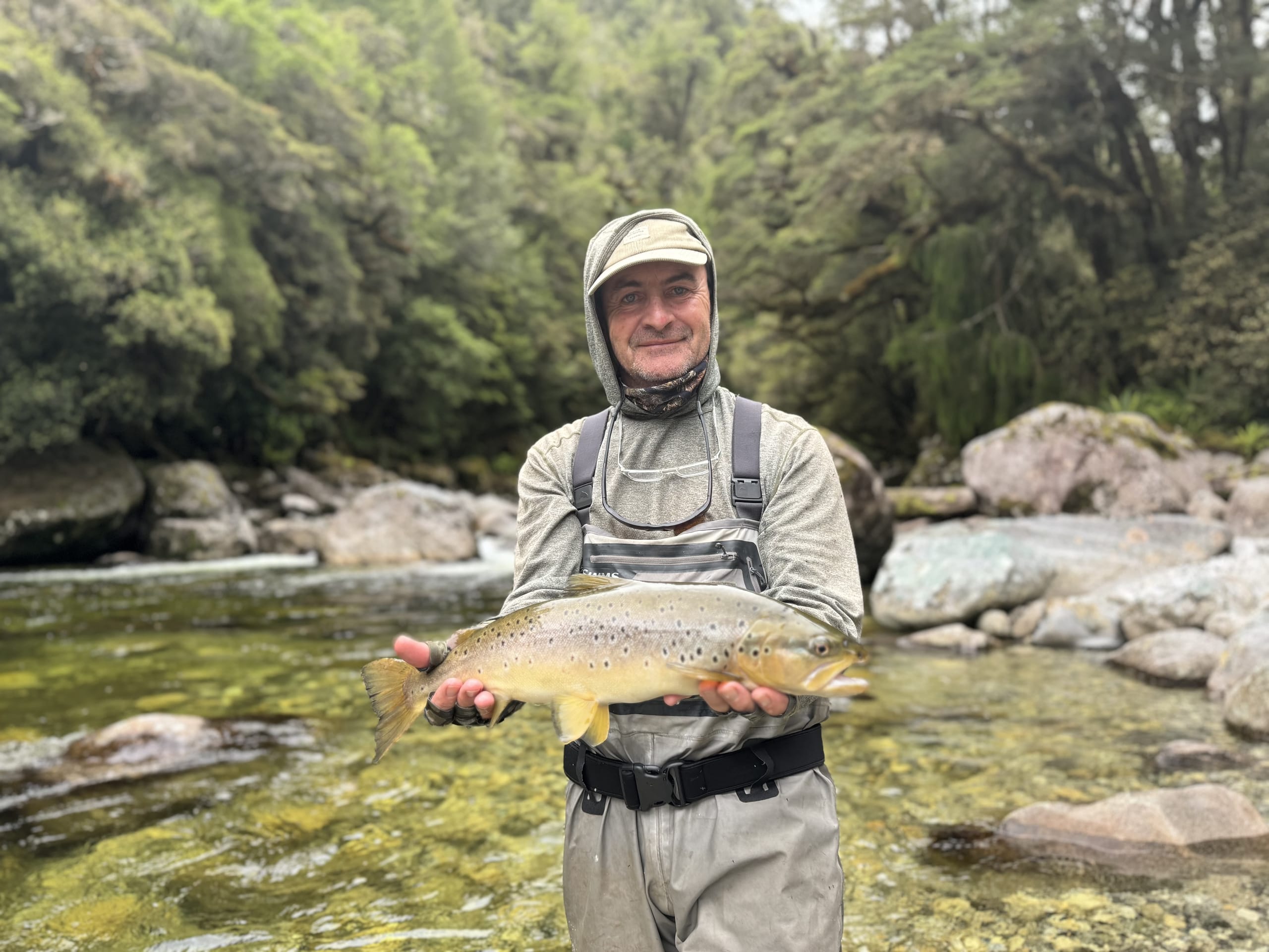 Angler wading a remote South Island spring creek
