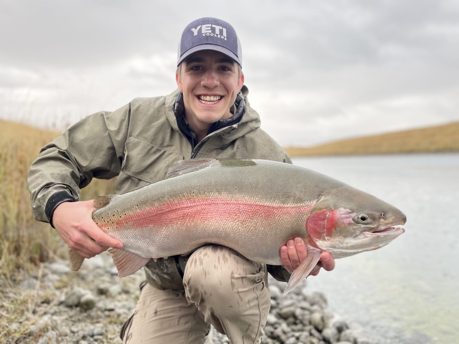 Guide and angler fly fishing a South Island river for the day