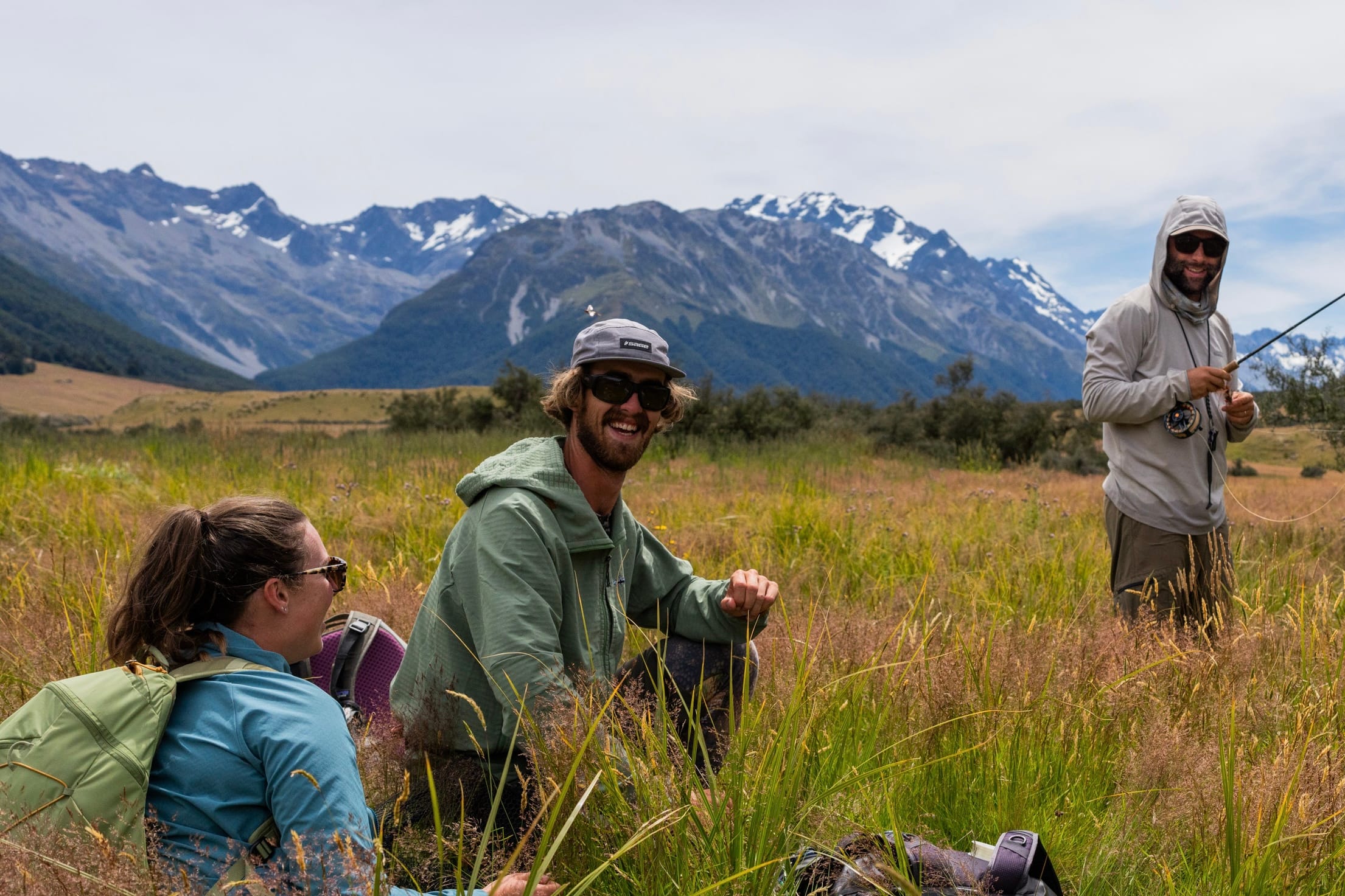 Angler with a trophy catch on a pristine New Zealand river