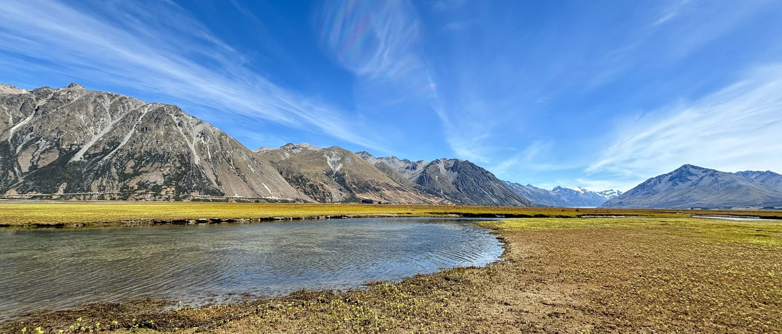 Guided fly fishing on a clear South Island river